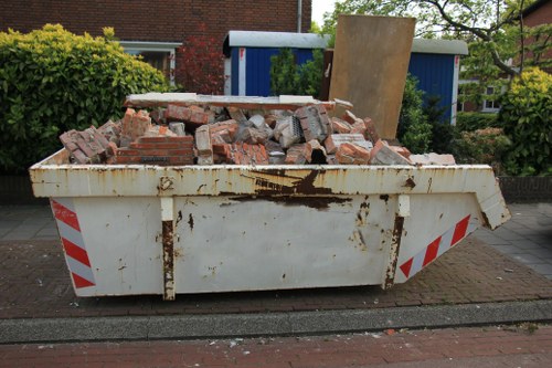 Professionals organizing a garage clearance in Hornsey