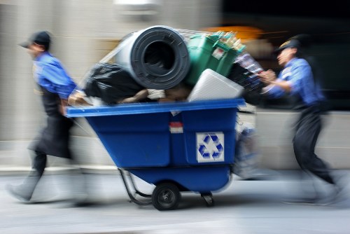 Bins for paper, glass, food waste and general waste in a sustainable rubbish area